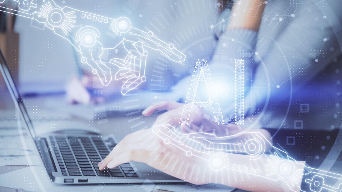 woman hands working on computer and AI theme hologram drawing